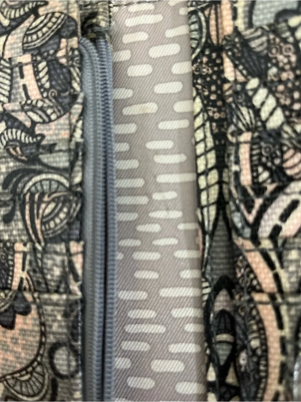 Sakroots button closure wallet with owl detail